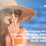 Perempuan Indonesia sedang mengaplikasikan sunscreen ke wajah sebelum beraktivitas di luar ruangan